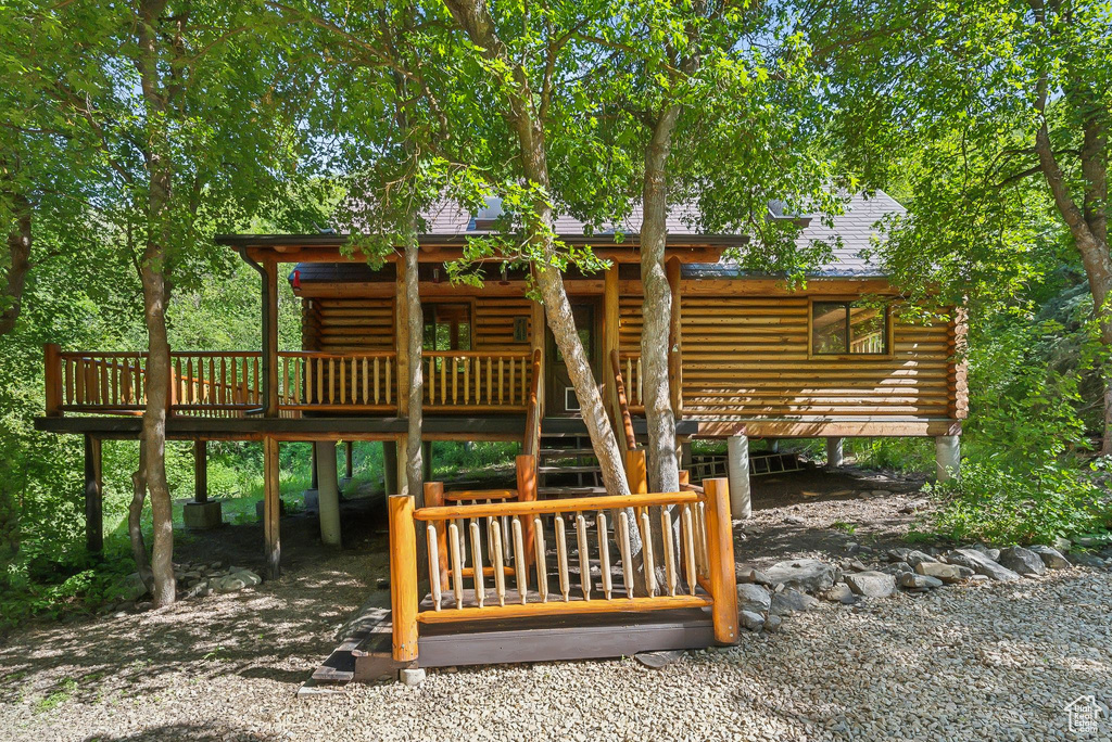 View of playground with a wooden deck