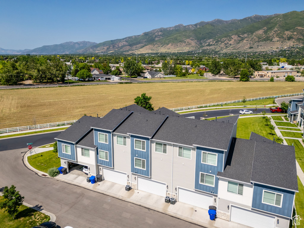Aerial view of residential area with a mountainous background