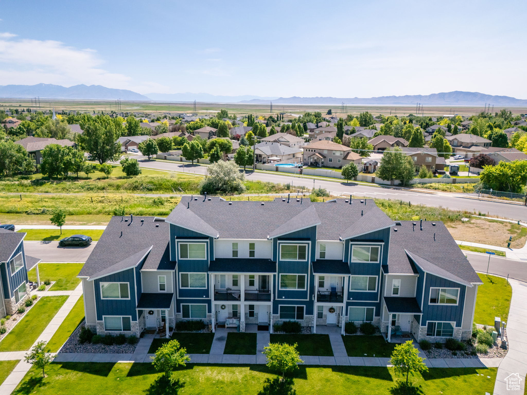 Aerial view of residential area with mountains