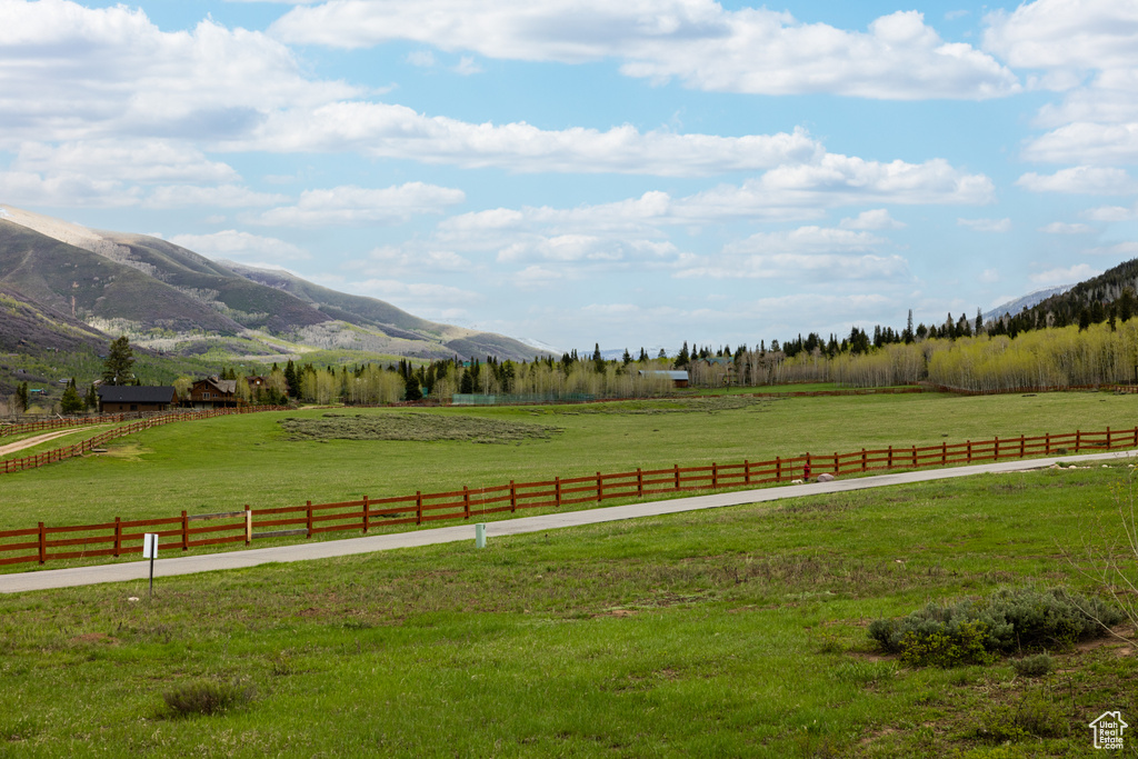 View of yard with a view of countryside and a mountain view