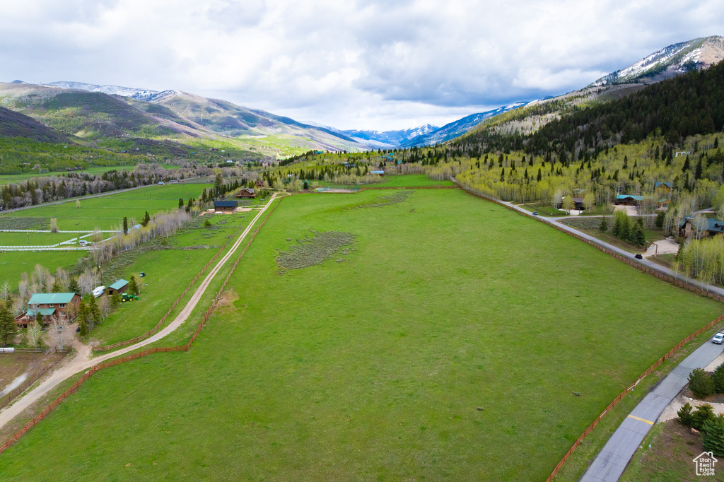 Aerial view of sparsely populated area featuring a mountainous background