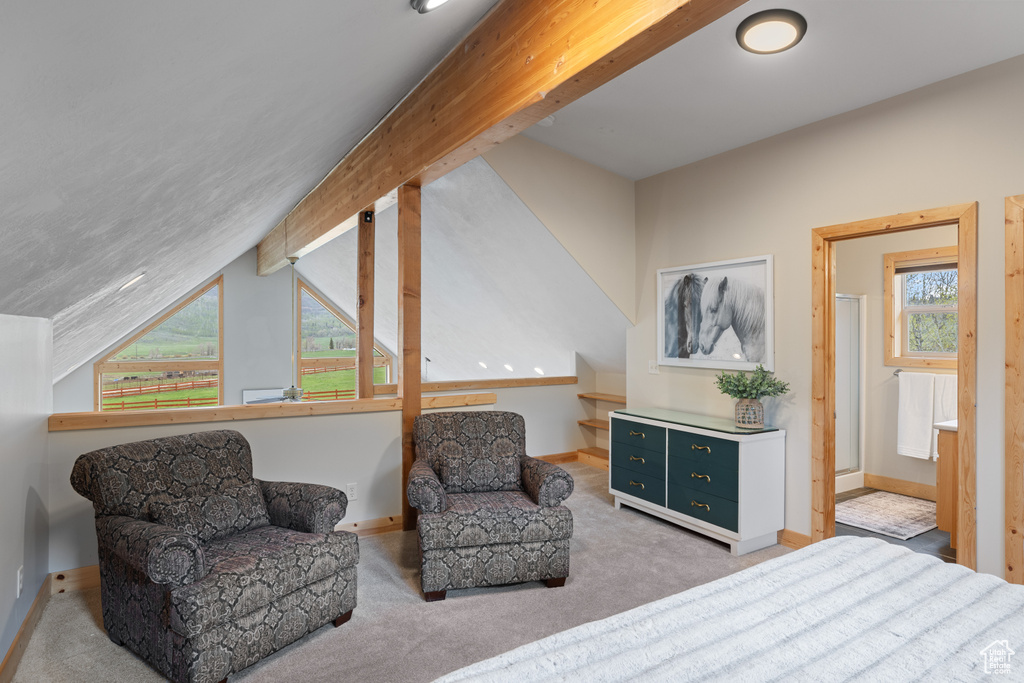 Carpeted bedroom featuring baseboards