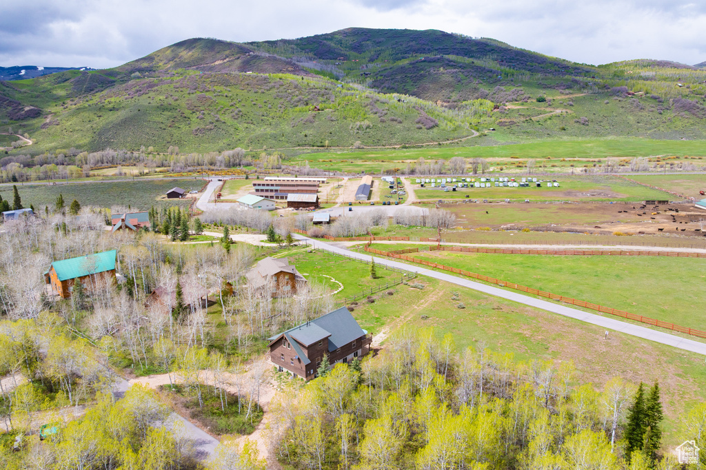 View of mountain background featuring rural landscape