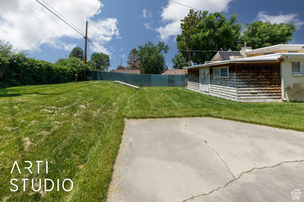 View of yard with a patio