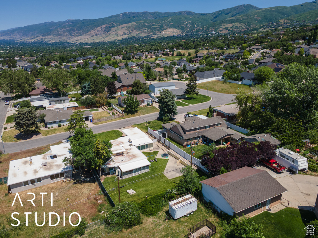 Aerial view of residential area with a mountain backdrop