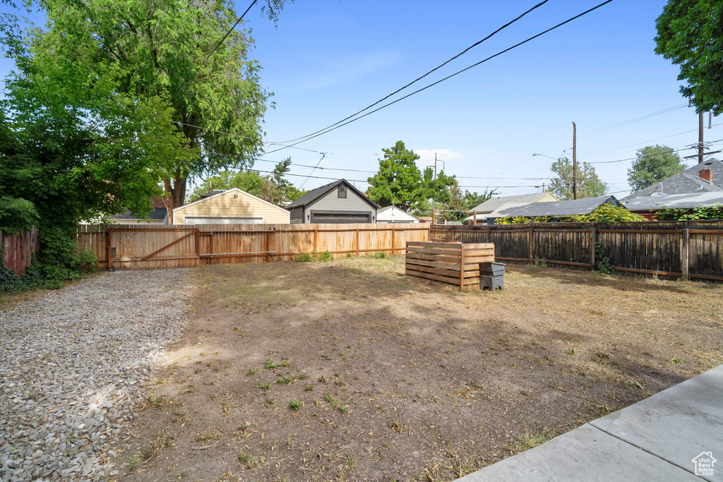 View of fenced backyard