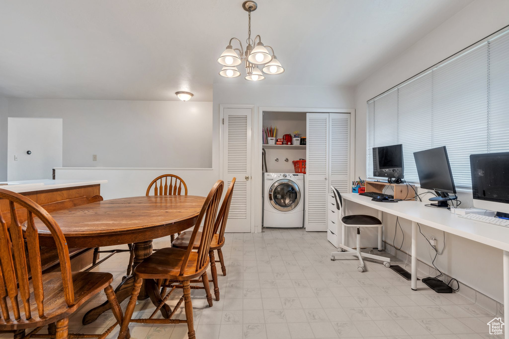 Dining room with washer / dryer, light floors, an office area, and a chandelier