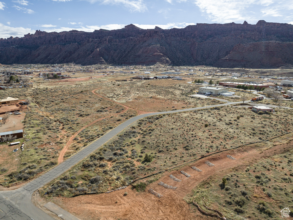 View of mountain backdrop featuring rural landscape and a desert landscape