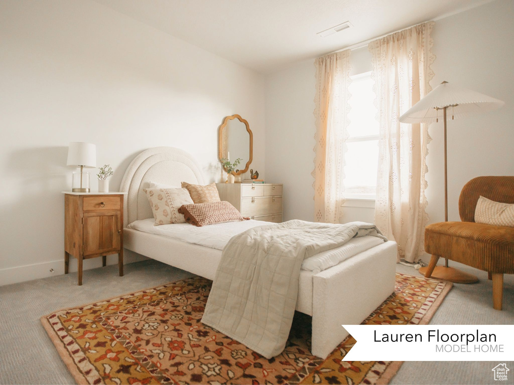 Bedroom with carpet and baseboards