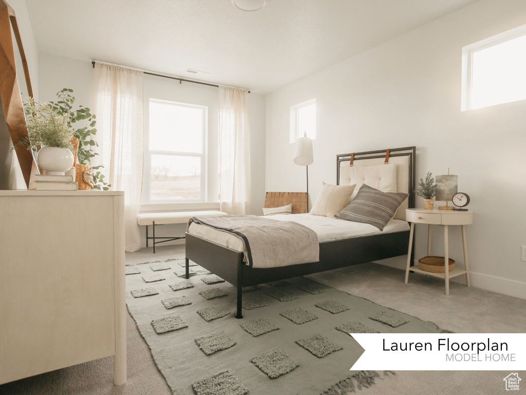 View of carpeted bedroom
