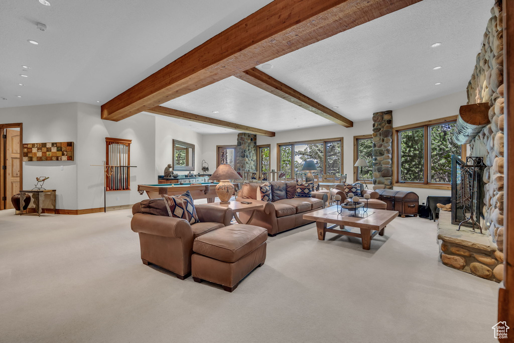 Carpeted living room featuring recessed lighting, pool table, beam ceiling, and baseboards