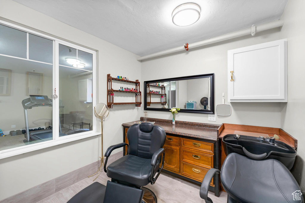 Office featuring light wood-style flooring and baseboards