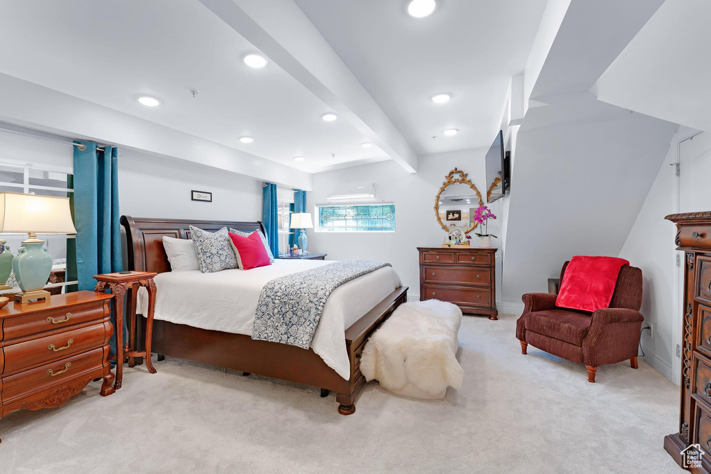 Bedroom with carpet flooring, recessed lighting, and beam ceiling