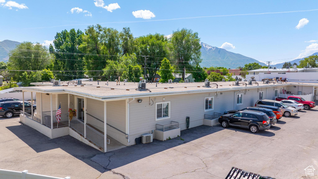 Rear view of house with a mountain view