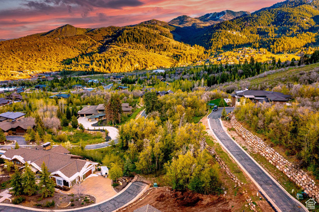 Aerial view at dusk of a mountain view and a residential view