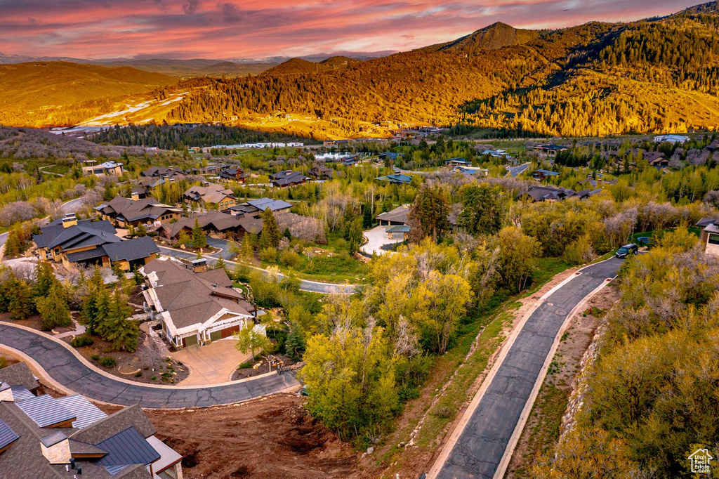 Aerial view at dusk of a mountain view and a residential view