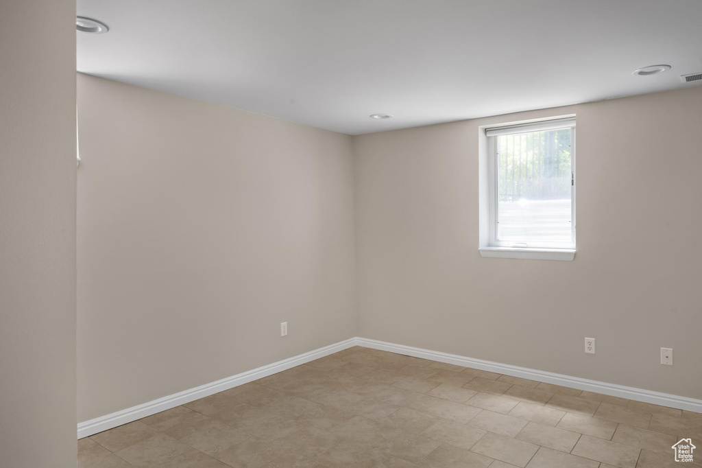 Empty room with baseboards