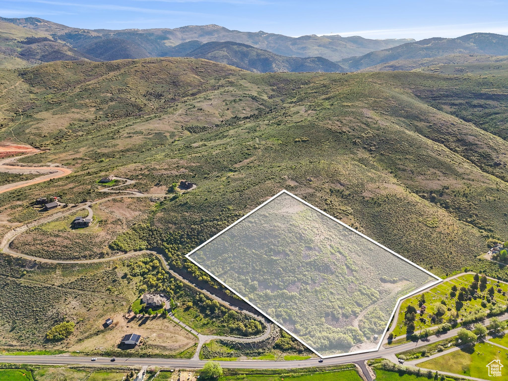 View of property location with property boundaries highlighted and mountains