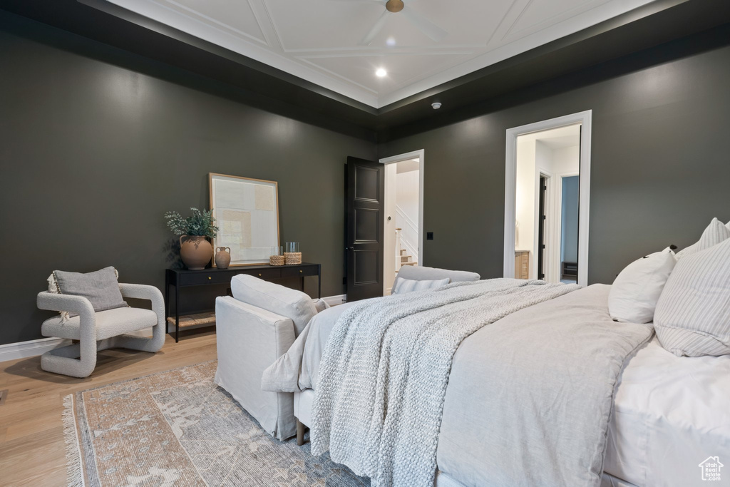 Bedroom with wood finished floors, recessed lighting, and baseboards