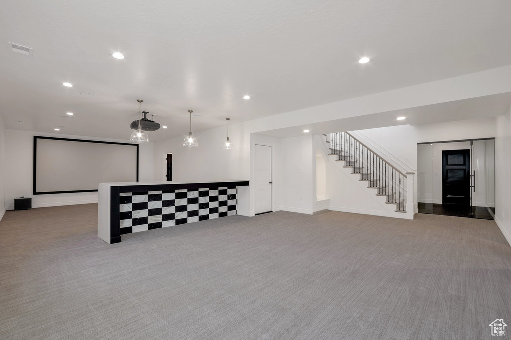 Cinema room with carpet flooring, recessed lighting, and baseboards