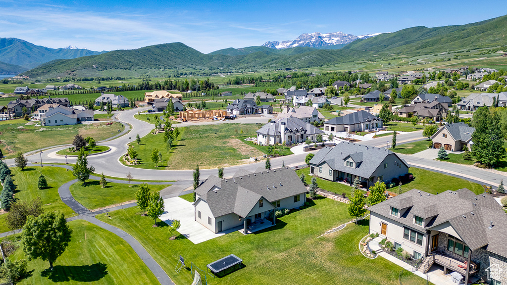 Aerial view of residential area with mountains