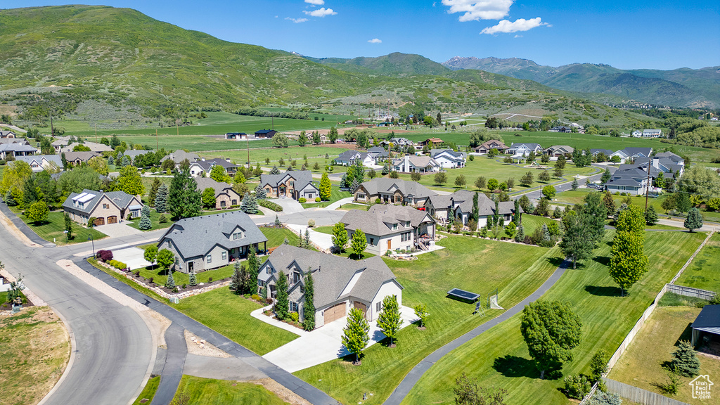 Aerial view of residential area with mountains