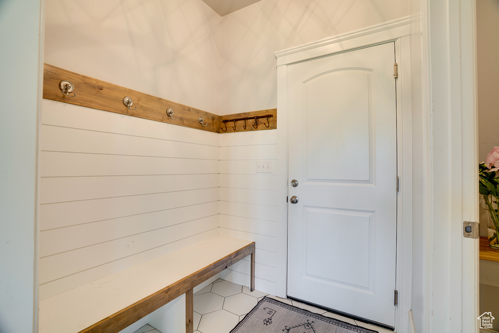 Mudroom featuring light tile patterned floors