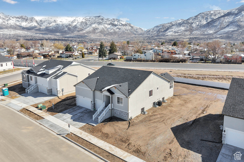Aerial view of residential area with mountains
