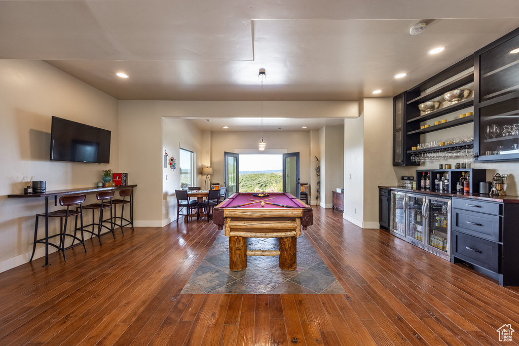 Recreation room with bar, dark wood-style floors, wine cooler, billiards, and recessed lighting