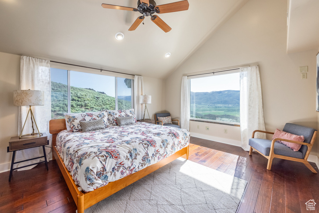 Bedroom featuring hardwood / wood-style flooring, baseboards, high vaulted ceiling, recessed lighting, and a ceiling fan