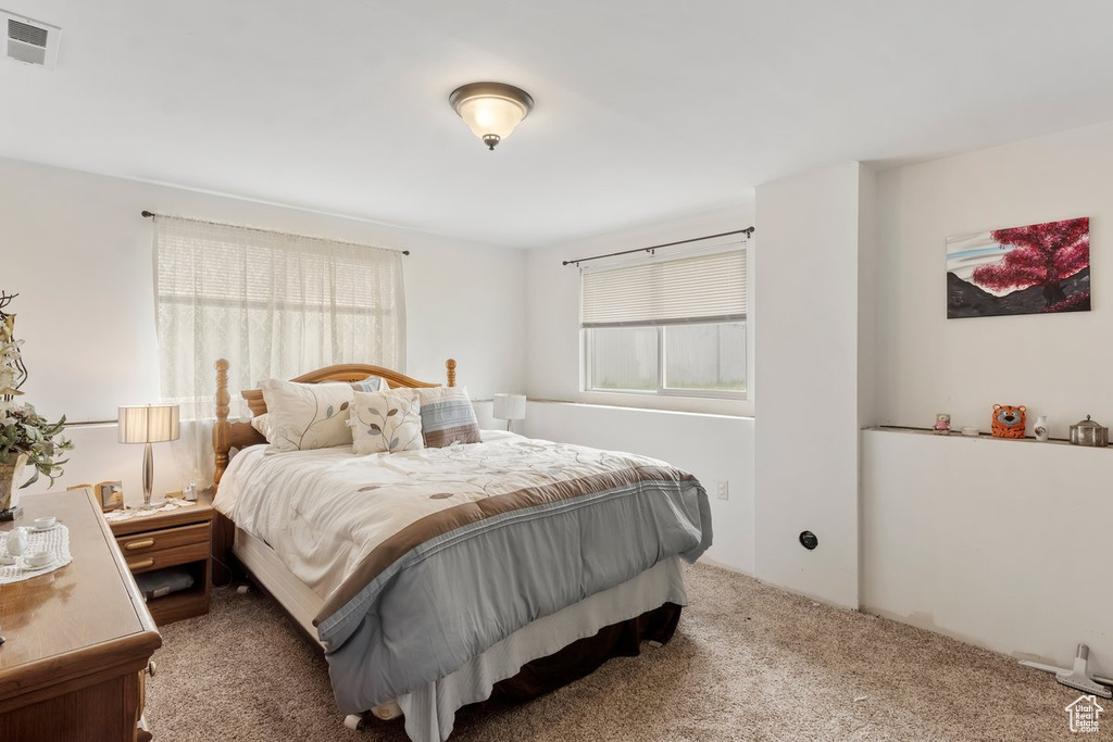 Bedroom featuring carpet floors