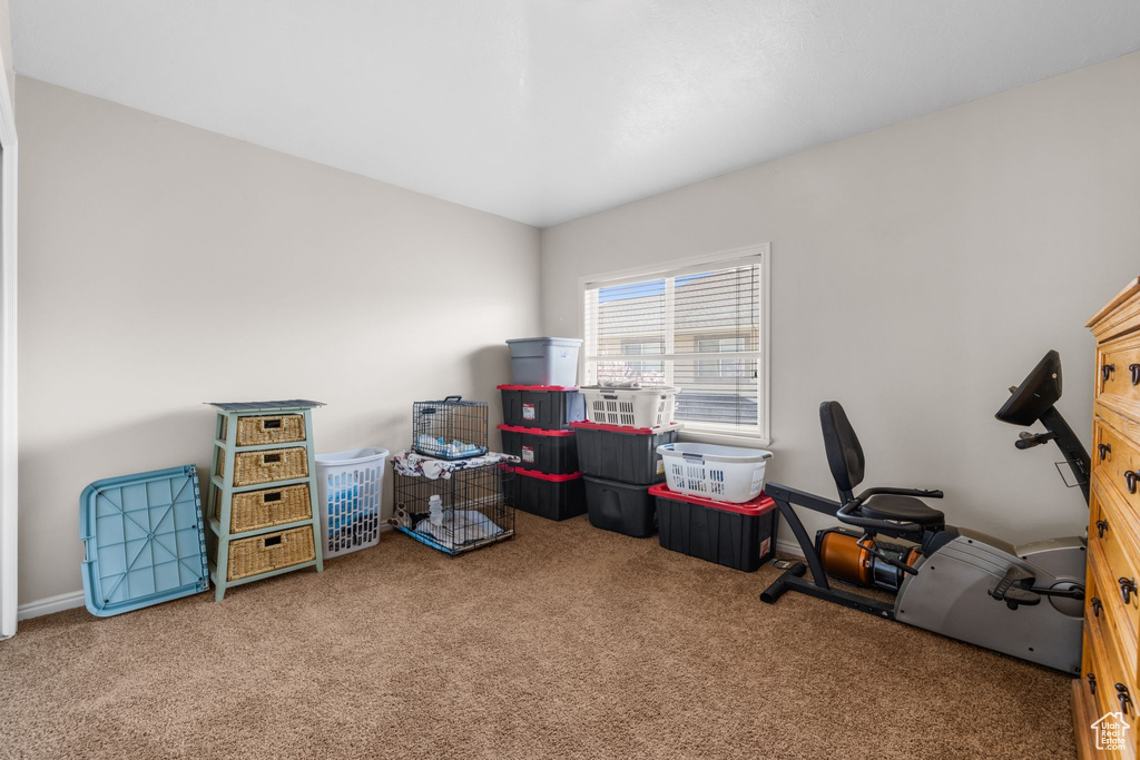 Carpeted office with baseboards