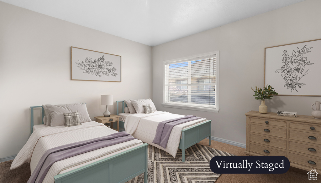 Bedroom with carpet flooring and baseboards