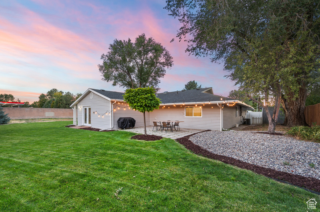 Back of property featuring a patio