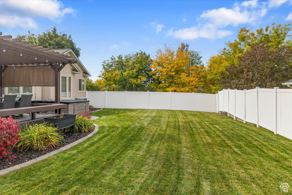 View of yard with a pergola