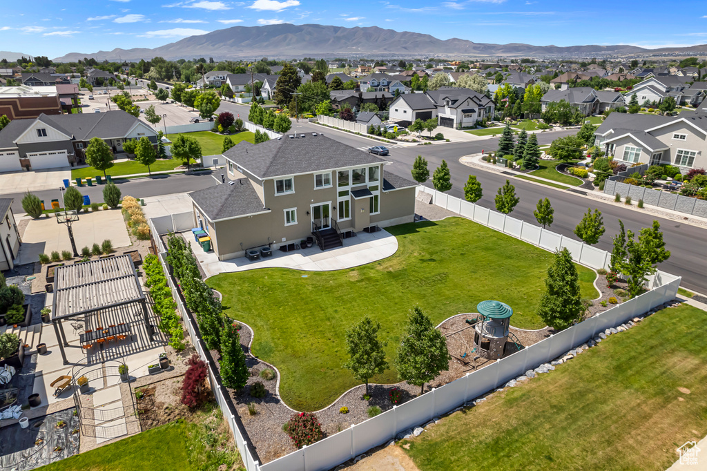 Aerial perspective of suburban area with mountains