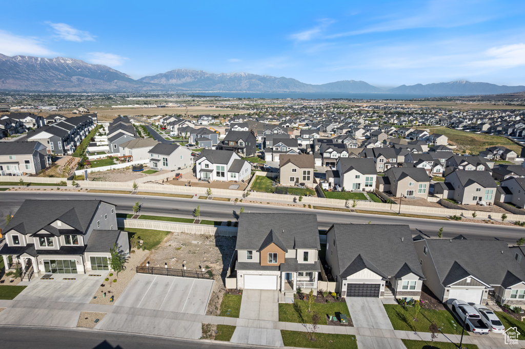 Aerial view of residential area with a mountainous background