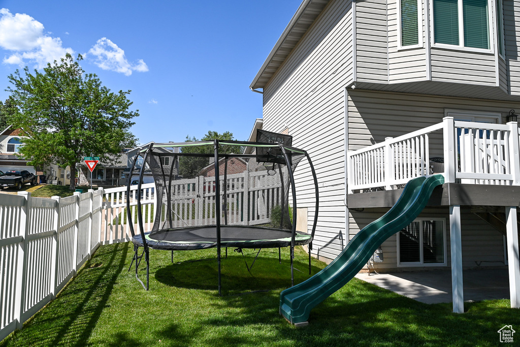View of playground with a trampoline