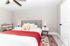 Bedroom with baseboards and ceiling fan