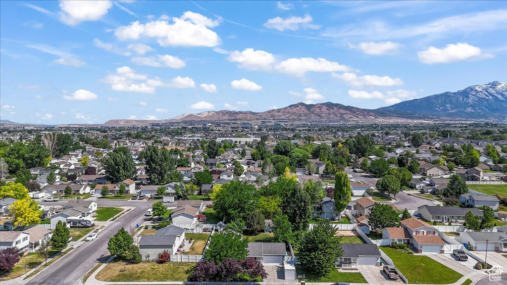 Aerial view of residential area with mountains