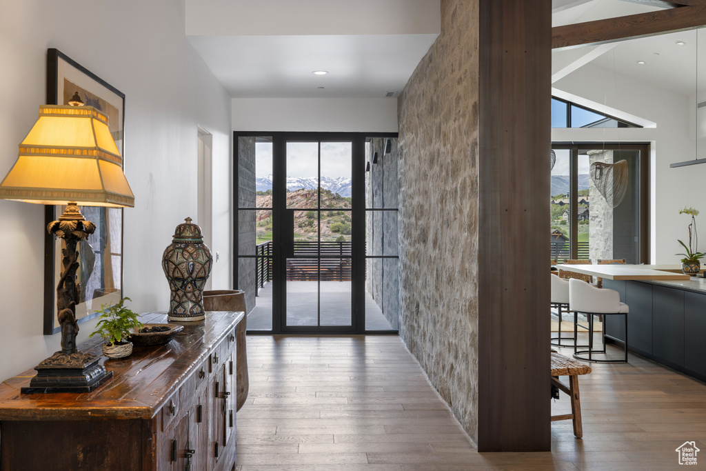 Foyer featuring hardwood / wood-style floors and recessed lighting