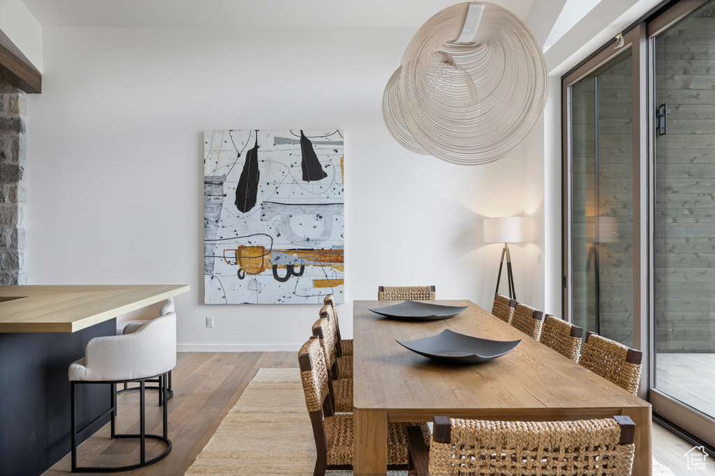 Dining area with wood finished floors