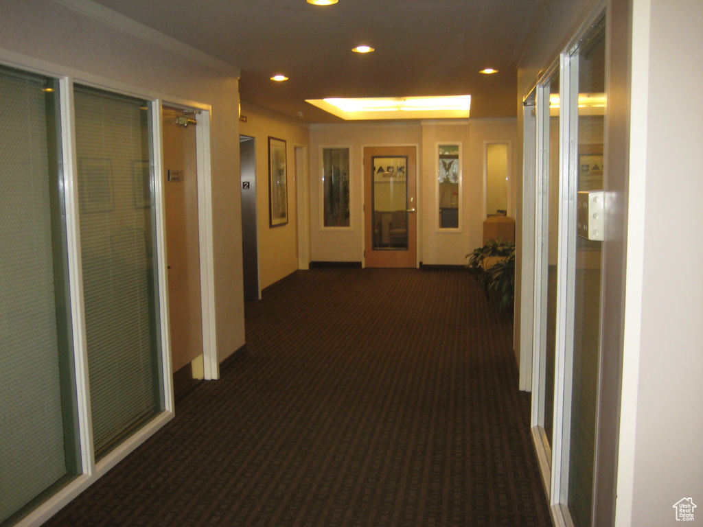 Hallway featuring elevator