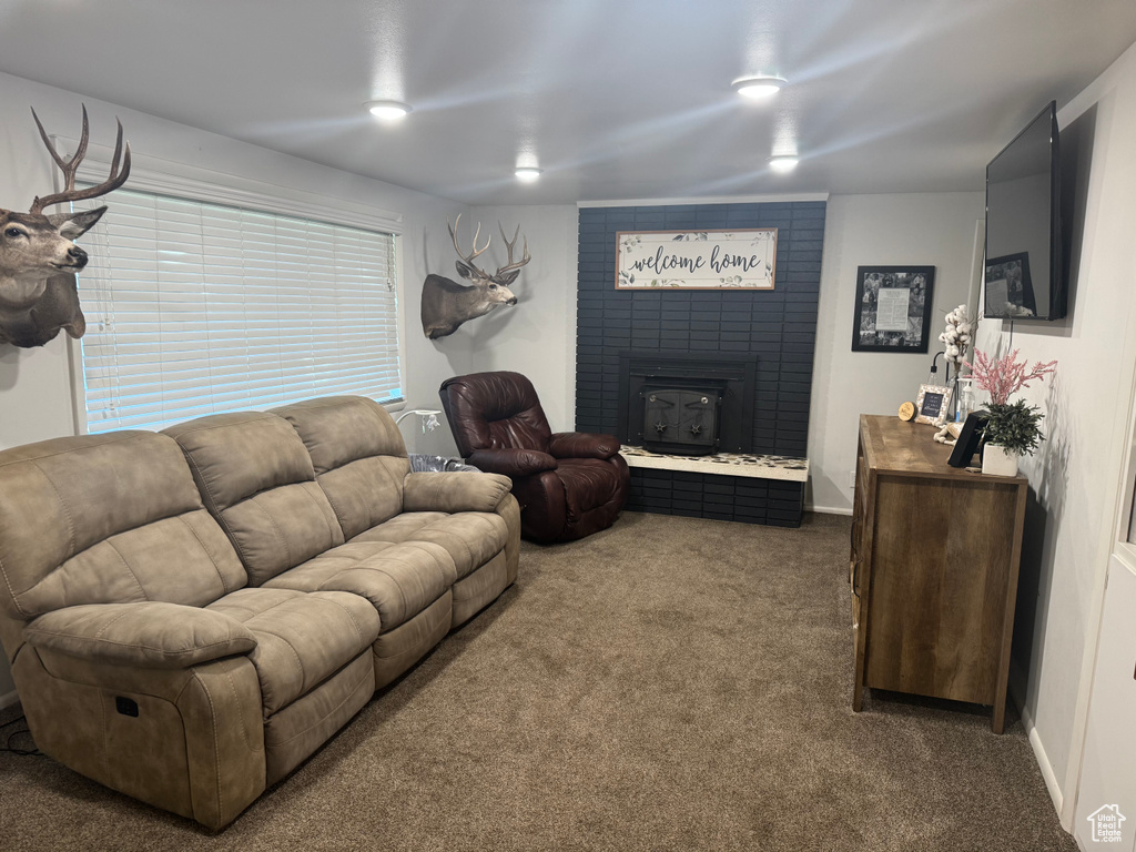 Living room with carpet floors and baseboards