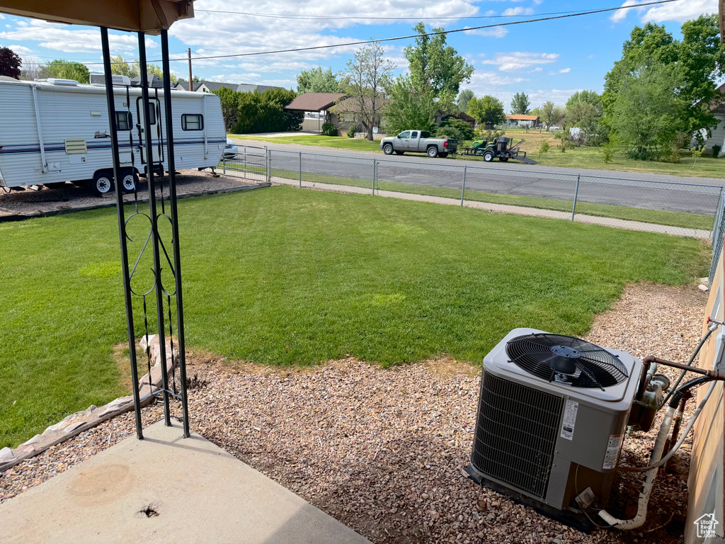 View of yard with cooling unit