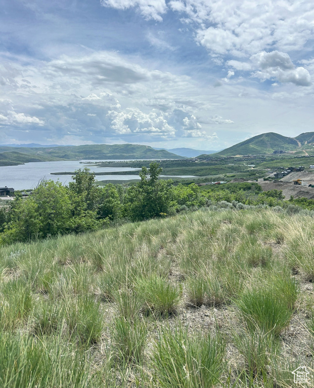 Mountain view with a nearby body of water