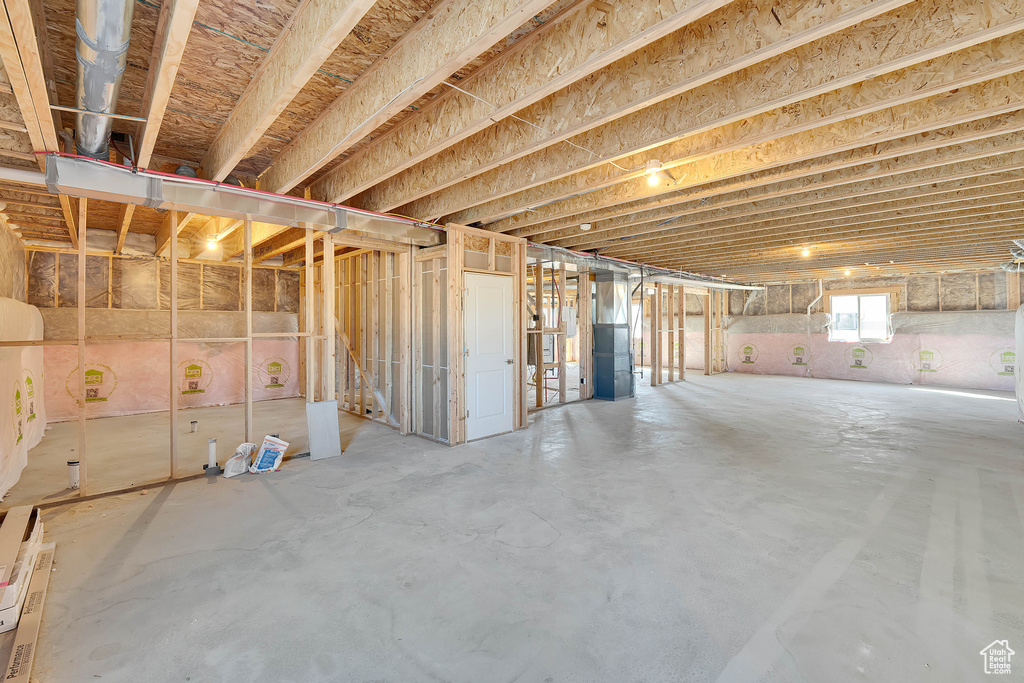 Below grade area featuring heating unit