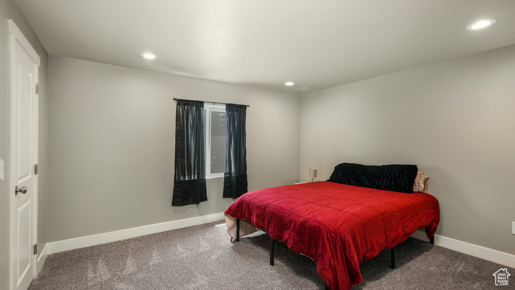 Bedroom with recessed lighting, carpet flooring, and baseboards