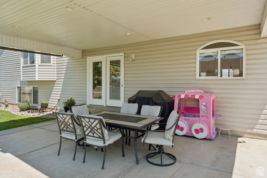 View of patio featuring outdoor dining area