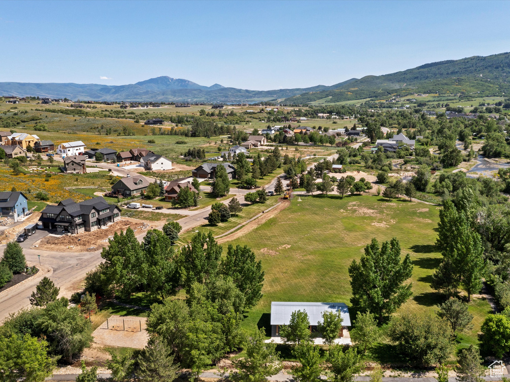 Aerial view of residential area with a mountain backdrop